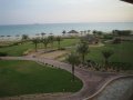  Danat Resort Beach. Oil tankers on the ocean