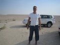  Asbjrn posing in front of the car and desert plains