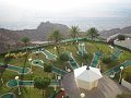  Minigolf view from the balcony with the base ground beneath the mountain behind