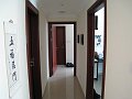  Bedrooms seen from living room - small toilet to the left, small bedroom/office to the right, master bedroom and bathroom straight!