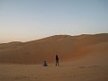  Energetic people climbing the dunes