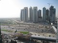  View from the small balcony over Jumeirah Lake Towers, Sheikh Zayed Road, Metro station to the right, Emirates Golf course to the left