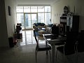  Living room. Another rug and curtains still missing.